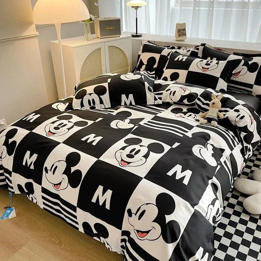 Disney 4-piece cotton bedding set with Mickey Mouse cartoon design on duvet cover, pillowcases, and flat sheet, ideal for a cozy bedroom atmosphere.