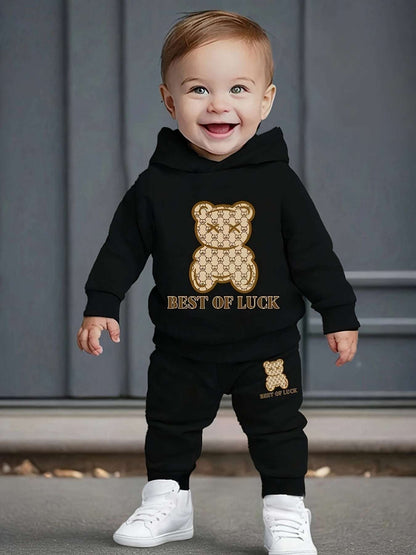 Cozy bear print sweatshirt and pants set for kids, playful design.