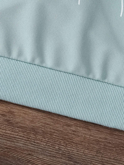 Close-up of the ribbed hem of a trendy two-piece set for girls, showcasing the high-quality knit fabric.