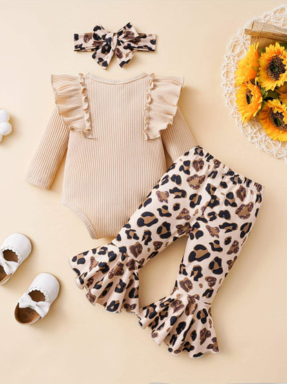 Adorable baby girl outfit with a beige ruffled top, leopard print pants, and matching headband, perfect for playtime comfort.