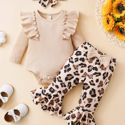 Adorable baby girl outfit with ruffled top and leopard print pants for comfort and style.