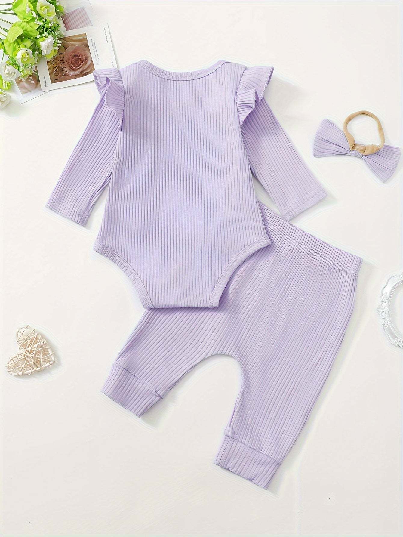 Best friend vibes cute set with Auntie's Bestie print, ribbed lavender outfit with long sleeve top, matching bottoms, and bow accessory.